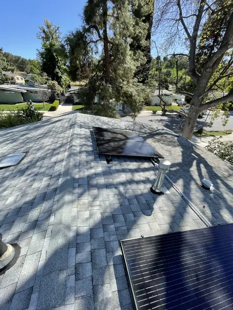 4.76 kW solar panel array on a rooftop in Woodland Hills, CA